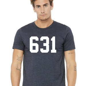 May include: A dark heather grey t-shirt with a white number "631" printed on the front.