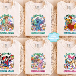 The image is a collage of six white t-shirts, each featuring a different cartoon character from Disney and Pixar. The characters include Woody, Stitch, Mickey Mouse, Donald Duck, Donald Duck's friend, and Donald Duck's daughter. The t-shirts are arranged in a grid format, with each t-shirt having a unique design and character on it.