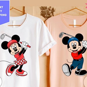 a couple of mickey mouse shirts hanging on a wall