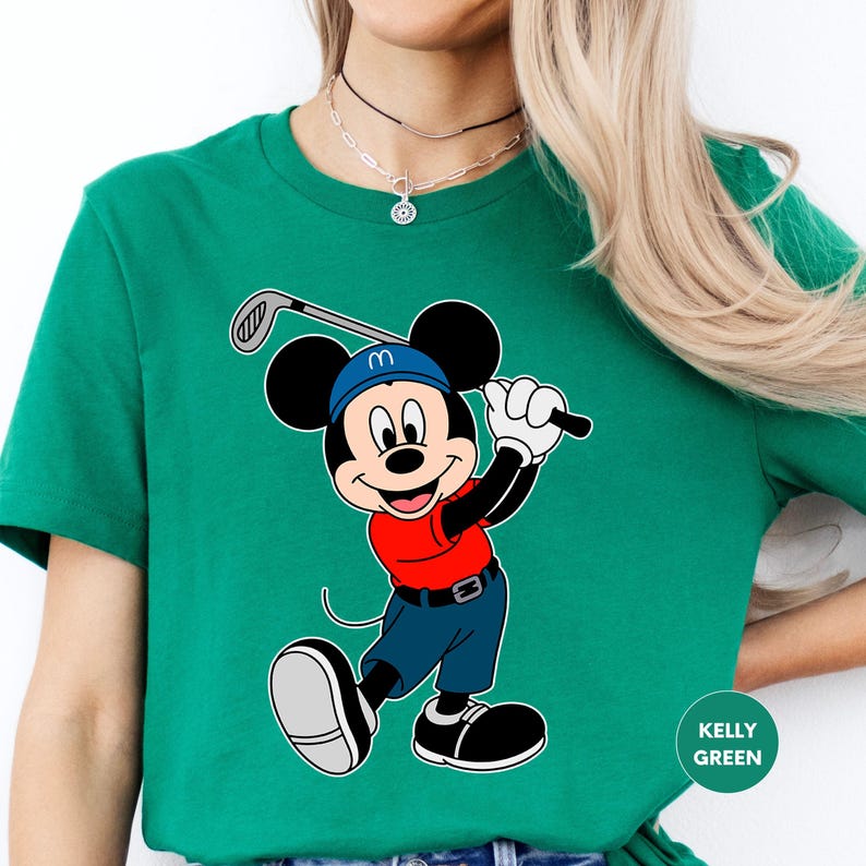 a woman wearing a mickey mouse t - shirt
