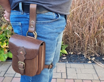Handmade leather belt pouch with leg  attachment
