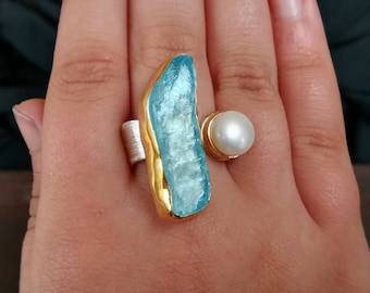 Anillo de plata y oro de la perla