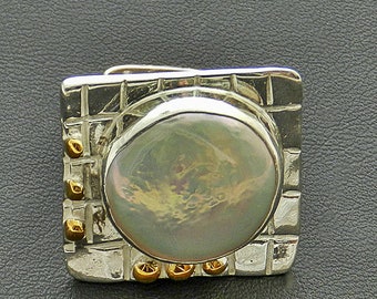 Anillo de plata y oro de la perla