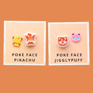 May include: Two sets of Poke Face character designs, Pikachu and Jigglypuff, are displayed on a light beige background. The Pikachu set includes a yellow character and a pink mold. The Jigglypuff set includes a pink character and a pink mold. Text reads "POKE FACE" and character names.
