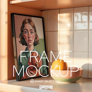 May include: A framed art print with a portrait of a woman and a dachshund dog. The frame is black. A bowl with a peach and the text "FRAME MOCKUP" are also visible.