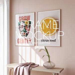 May include: Two framed art prints. One shows a floral face with the words "GROW GENTLY". The other displays a lemon slice with "citrus soul". A bench with a pink cloth and a vase with a flower are in front.