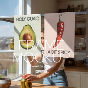 May include: Two food-themed posters are displayed. One shows a sliced avocado with the text "HOLY GUAC", and the other a red chili pepper with the text "A BIT SPICY". A jar of pickles is also visible in the image.