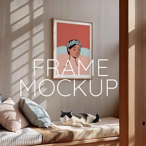 May include: A framed illustration of a woman with a flower crown, against a red and blue background. The frame is on a wall in a room with a couch and a cat.