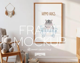 May include: A framed print with a light wood frame featuring a cartoon hippo in a bathtub with bubbles. The print has the words "HIPPO HUGS" at the top. The image is a mockup in a nursery setting with a rocking chair and stuffed hippo.