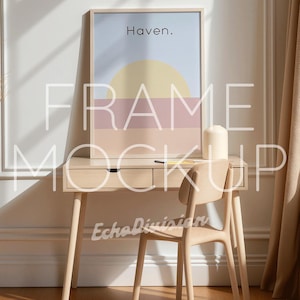May include: A wooden desk with a drawer and a wooden chair. A framed print with the word "Haven." is on the desk. The print has a light blue background with a yellow sun and pink and peach stripes.