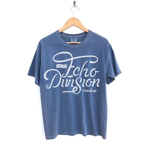 Hanging Shirt Mockup Flo Blue Garment Dyed Heavyweight Ringspun Short Sleeve Shirt 1717 flat lay photography Comfort Colors