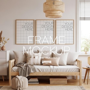 May include: A living room mockup featuring three framed prints with the text "YOUR DESIGN HERE" above a light wood daybed with beige pillows and a woven throw. A woven pendant light hangs above the daybed, and a woven ottoman sits in front.