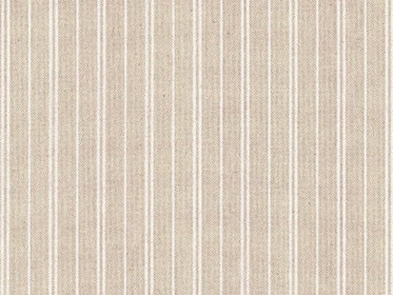 May include: A beige fabric with thin white stripes. The fabric has a subtle texture.