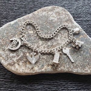 Vintage Sterling Silver Charm Bracelet including a Fox Head + Pram + Key + Cot + Aeroplane + Good Luck  | Bracelet Size UK=17.5cm USA=6.9in
