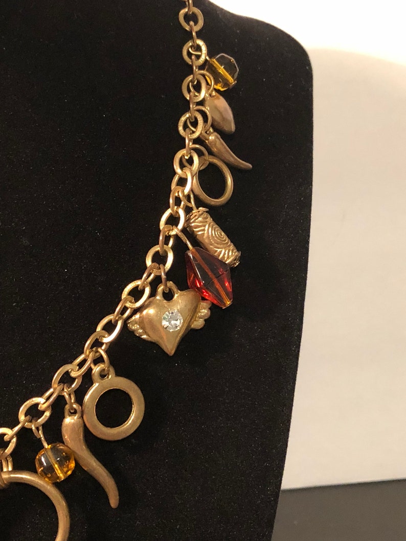 horns and amber beads Charm gold toned necklace hearts