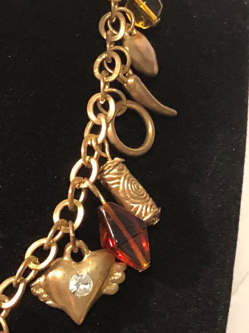 horns and amber beads Charm gold toned necklace hearts