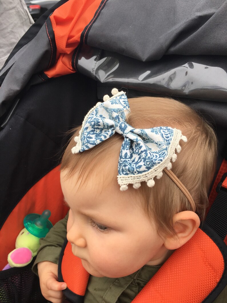 Blue paisley with pom pom fringe bow