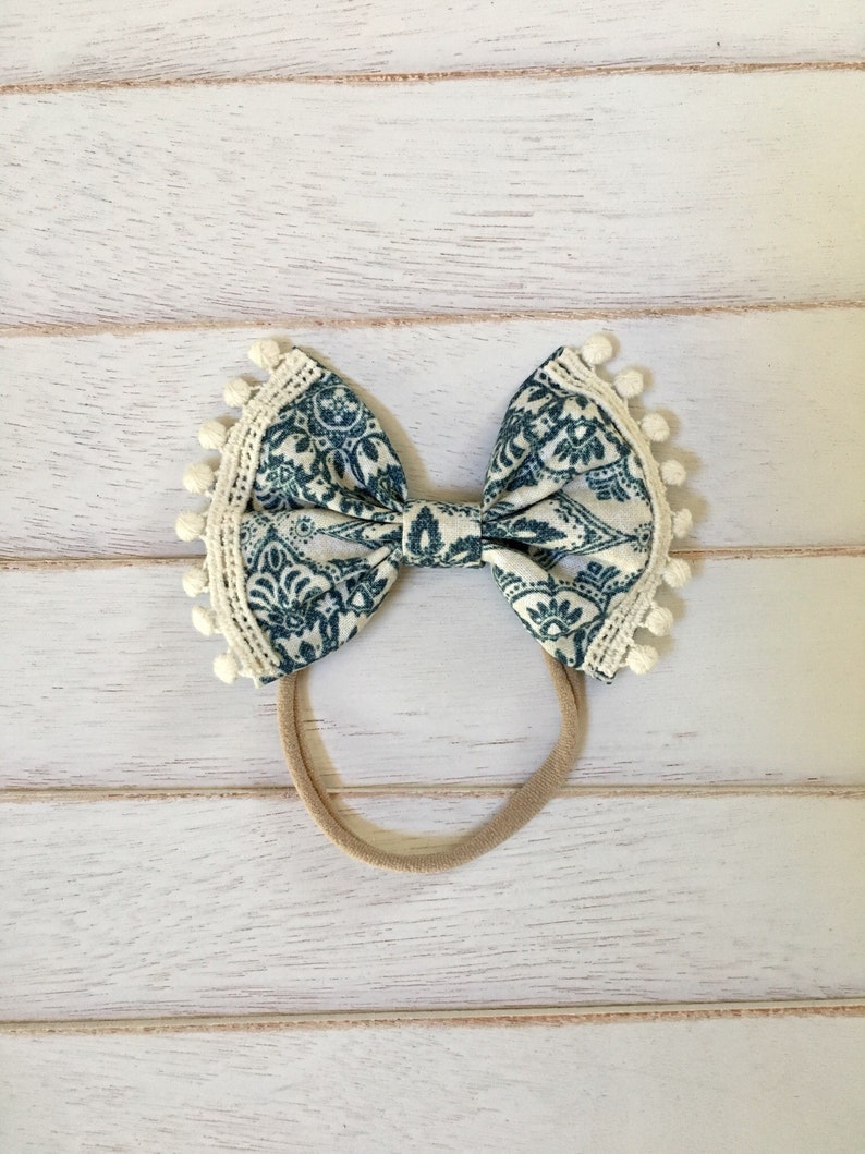 Blue paisley with pom pom fringe bow