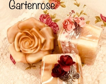 Garten Rose Pflanzenölseife schön verpackt. Die Seife kann in Form und Farbe abweichen