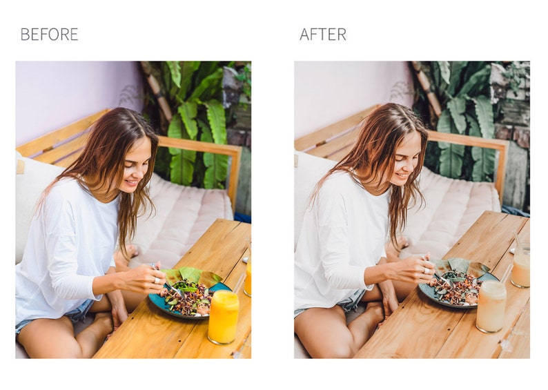 May include: A woman sits at a wooden table, eating a salad with a fork. She is wearing a white long-sleeved shirt and denim shorts. There is a glass of orange juice on the table next to her plate.