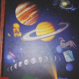 May include: A book cover with a blue background and a colorful illustration of planets, stars, and a comet. The title of the book is "SKYWATCHING" and the author is "David H. Levy".