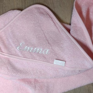 May include: Pink hooded towel with the name "Emma" embroidered on it.