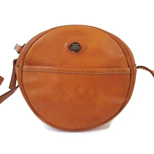 THE BRIDGE stunning cognac brown round mini crossbody shoulder bag.  Designer shoulder bag.