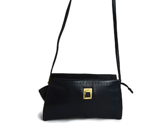 GENNY Gianni Versace vintage blue soft leather gold shoulder bag.