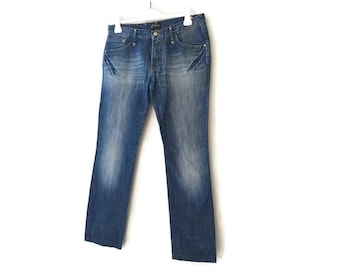 Vaqueros vintage VERSACE de corte acampanado: detalle de cabeza de Medusa, denim lavado, talla 32