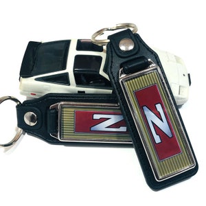 Key Fob Key Ring Keychain For Nissan 300ZX Z31 Steering Wheel Emblem (2-Pack)