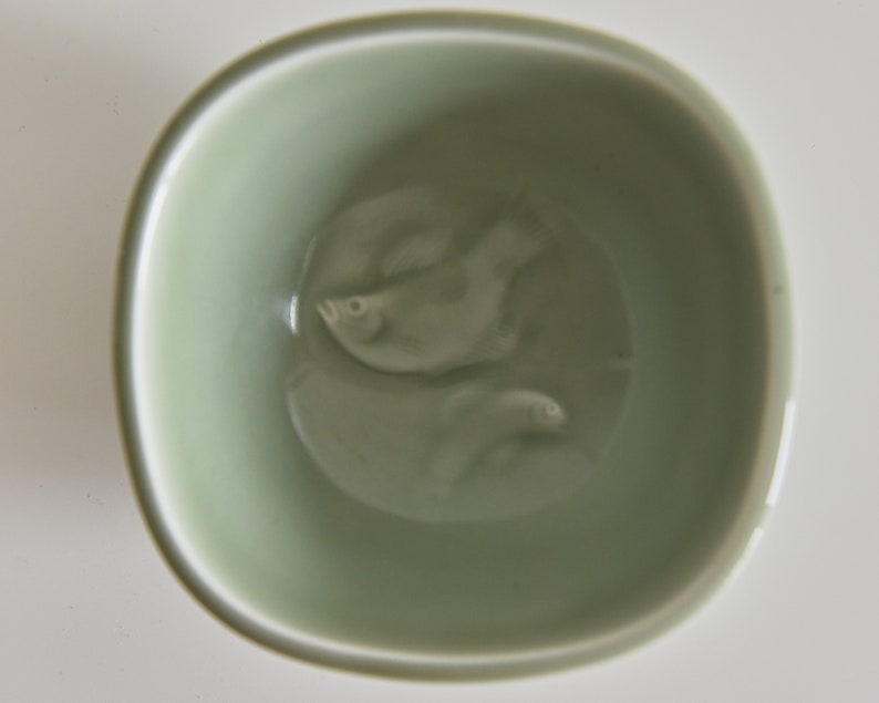 Nils Thorson for Royal Copenhagen Celadon glazed bowl with two f