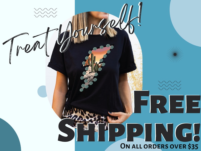 May include: Black t-shirt featuring a desert landscape design within a lightning bolt shape. The design includes cacti, mountains, and a sunset. The words "Treat Yourself!" are written in a script font.