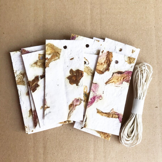 scooped paper /tags, with flowers paper recycling / handmade / scrapbooking and sketching / collage
