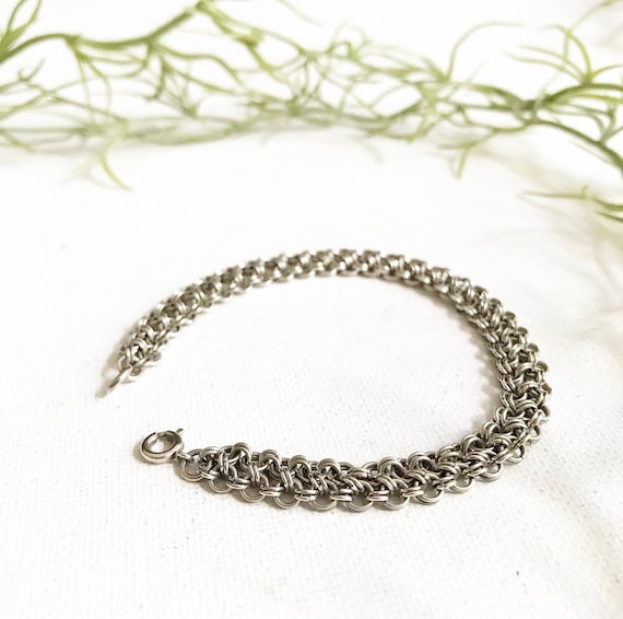Vintage 835 silver bracelet / small rings intertwined