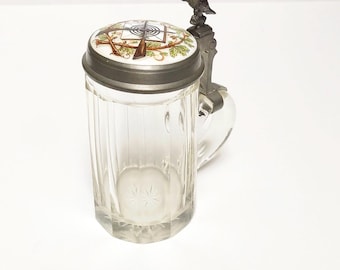 Antique glass beer mug with eagle lifter, German hunter's mug, tankard with porcelain lid and hand-painted hunting motif