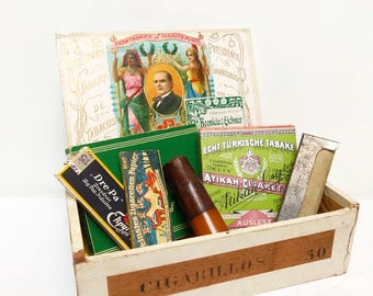 Antique Tobaciana Set, Cigarillo wooden box "Presidente" Attika and Memphis cigarettes, Efka and Dre-pa paper, mouthpiece Bruyere, amber