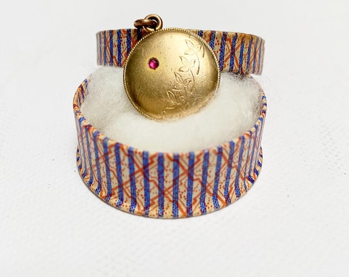 Antique Art Nouveau jewelry pendant with a ruby, necklace pendant in jewelry box, gold-plated