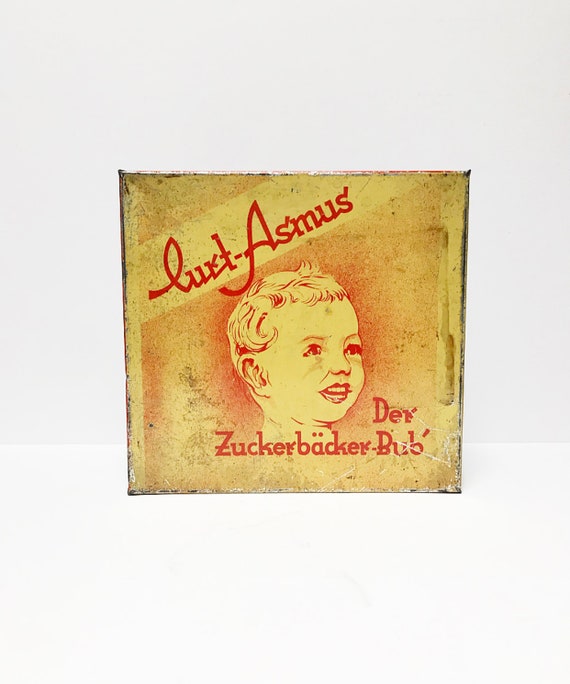 Antique Art Deco tin can "The Sugar Bread Boy" Asmus, Limburg, yellow-red, brown cakes