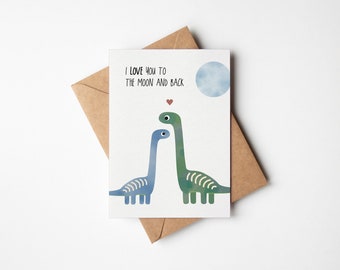 May include: A greeting card with a blue and green dinosaur couple with the text "I love you to the moon and back" and a watercolor moon in the background.