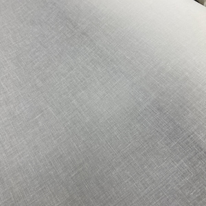 May include: White sheer fabric with a subtle texture. The fabric is lightweight and translucent.