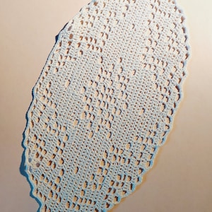 crocheted doily, oval