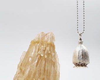 Colgante de cápsula de amapola