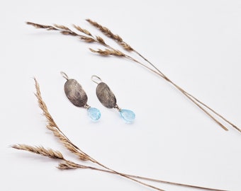 Silver earrings with topaz pears