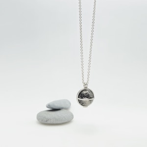pendant with moon sound ball