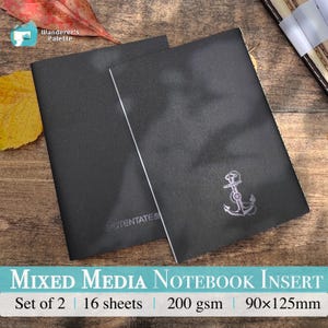 May include: Two black mixed media notebook inserts with an anchor design. The inserts are 90x125mm, with 16 sheets and 200 gsm. The text on the image reads "MIXED MEDIA NOTEBOOK INSERT".