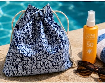 Waterproof bag for the pool or the sea with a blue wave pattern
