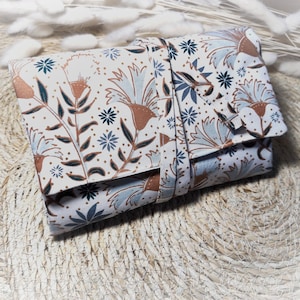 Pochette à bijoux de voyage motif fleuri