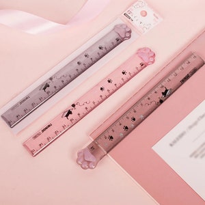 Règle droite mignonne de patte de chat de 1 pièce, règle en plastique de dessin d'étudiant, règle rose et grise de patte de chat, échelle de mesure d'étudiant, règle de chat d'animal