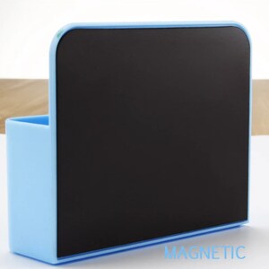 May include: A light blue magnetic memo board with a black writing surface and a small pen holder. The word "MAGNETIC" is printed in light blue at the bottom right corner.