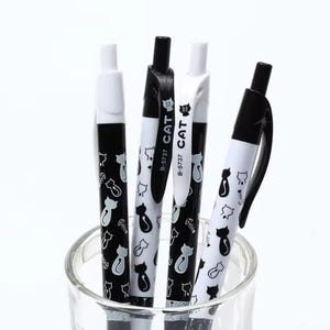 4 stylos à bille chat mignon, stylo chat noir et blanc, stylo à encre bleue, stylo à écriture 0,5 mm, fournitures de papeterie